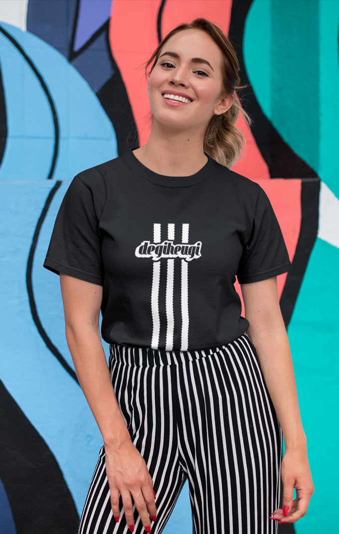 tee-mockup-of-a-smiling-girl-in-front-of-a-wall-with-colorful-illustrations-26646